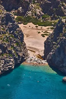 Towels Prints: Hidden Rocky Cove Beach With Turquoise Water And Crowded Shoreline For Holidays And Travel
