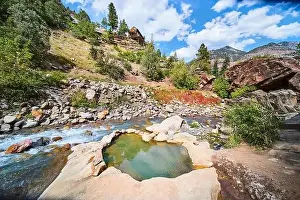 Hot Spring Prints: Hidden secret hot spring along river of mountains with log cabin overlooking
