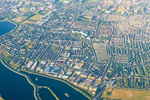 Outskirts Prints: High angle above aerial bird's eye drone view from airplane over city of London in United Kingdom with terraced