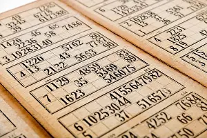 Entertain Prints: High angle closeup of craft bingo cards with numbers from old Bingo game