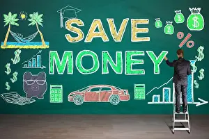 Piggy Prints: High Angle View Of Businessperson Drawing Save Money Concept On Diary At Wooden Desk In Office