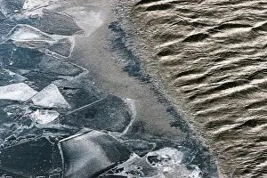 Overhead View Prints: High angle view of water at spring with the ice partly melted. Stockholm, Sweden