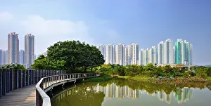 Ponds Prints: High rise apartments above Wetland Park in Hong Kong, China