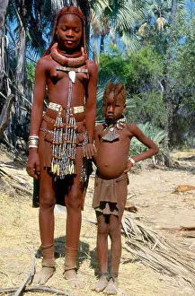Himba girl and boy in the Kaokoveld near the Cunene River, Namibia