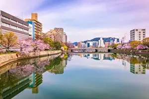 Hiroshima, Japan downtown cityscape on the Enko River at twilight