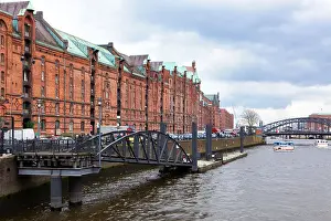 Speicherstadt Prints: Historic warehouses at the Speicherstadt Hamburg, harbor tour boats on the canal