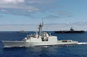 Exercise Prints: HMCS Algonquin (DDG 283) operates in formation with USS John C