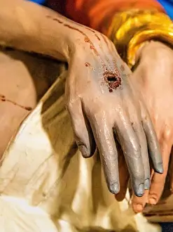 Blood Prints: hole of nail in hand of Jesus