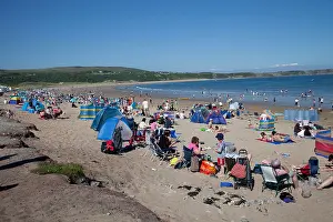 2009 Prints: Holidaymakers on crowded beach Oxwich Bay Gower South Wales UK