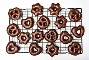 Cacao Prints: Homemade chocolate pretzels on a cooking grid top view
