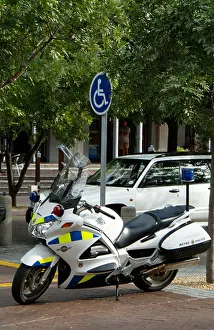 Cape Town Prints: Honda police motorcycle Cape Town South Africa Parked near a handicap parking slot
