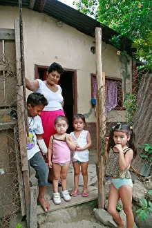 Slum Prints: HONDURAS Family of the slum barrio of Chamelecon San Pedro Sula PHOTOGRAPHY by SEAN SPRAGUE 2006