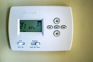 Thermostat Prints: A honeywell thermostat for home central heating fixed to a wall
