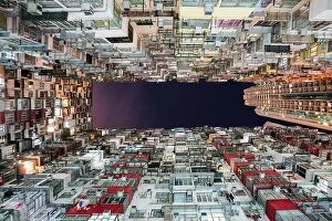 Images Dated 13th August 2017: Hong Kong city residences area. Low angle view image of a crowded residential building in