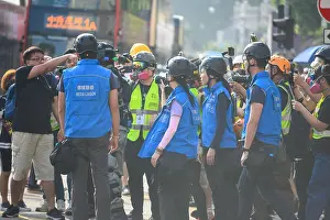 Hong Prints: Hong Kong - Oct 27, 2019: Police break into an Anti-Police violence peaceful assembly in Tsim Sha Tsui