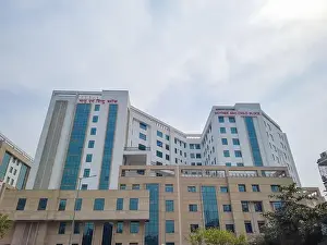 Urgency Prints: hospital multistory building with cloudy sky at morning image is taken at aiims delhi india on Apr 14 2022