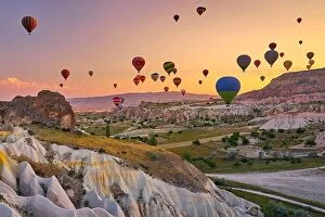 Images Dated 5th June 2018: Hot air balloons at sunrise, Goreme, Cappadocia, Turkey
