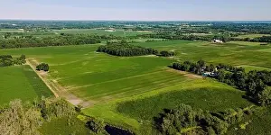Diminishing Perspective Prints: A hot summer day with a clear sky showing rural wisconsin farm fields