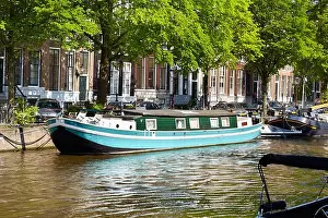 Houseboat barge, Amsterdam canal - Holland Netherlands