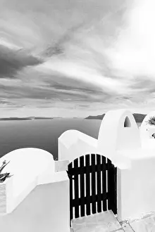 Houses of Santorini in black and white. Monochrome travel landscape, Greek architecture, summer vacation, holiday vibes. Greece village view