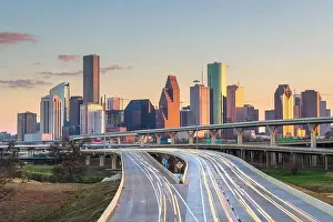 Houston, Texas, USA downtown skyline over the highways at dusk