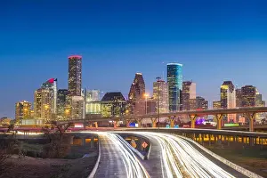 Houston, Texas, USA downtown skyline over the highways at dusk