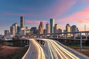 Houston, Texas, USA downtown skyline over the highways at dusk