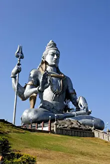 Worshiping Prints: Huge idol Lord Shiva hillock Kandukagiri Murudeshwar Uttar Kannada Karnataka india