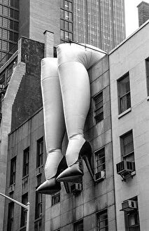 Kitsch Collection: A huge pair of inflated female legs on a building in midtown Manhattan advertise an exhibition at