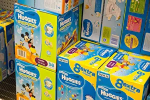 Infants Prints: Huggies nappies on sale in an australian woolworths supermarket store supermarket, Sydney