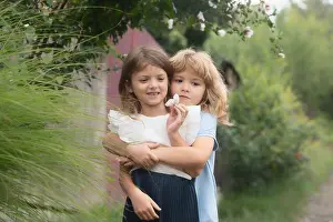 Love Together Prints: Hugging and kissing kids couple