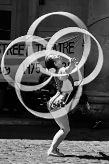 Hula hoop artiste performs at the 50th anniversary celebration of Covent Garden Street Theatre, May 20205. London UK