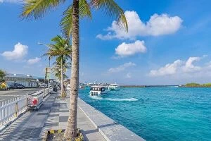 Images Dated 12th August 2022: Hulhule island, Maldives - 01.19.22: Boats at the harbor next to Ibrahim Nasir International