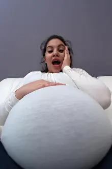 Prenatal Prints: Humorous shocked reaction of pregnant mom to her big growing tummy