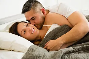 Holding Hands Prints: Husband kissing wife in morning