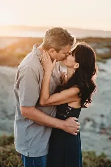 Earrings Prints: Husband and wife exchange romantic kiss at the Bach