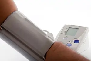 Measuring Prints: Hypertension - Blood Pressure and heart rate monitor device on white background