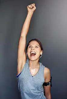 Toned Prints: I did it. a sporty young woman celebrating a victory against a gray background