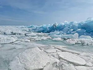 Snow Lake Prints: Ice chunks glisten under the sun