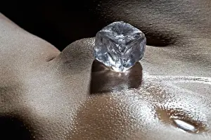 Cubes Prints: Ice cube on womans stomach