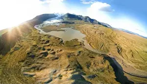 Weather Forecast Prints: Icelandic aerial landscape. Panorama of the Fjallsarlon glacier and the lagoon at sunset