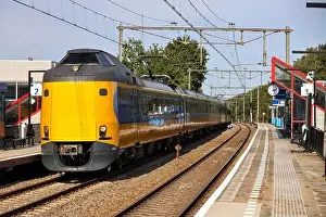 ICM Koploper intercity train of NS running along Nieuwerkerk aan den IJssel in the Netherlands