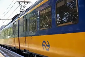 Public Transportation Prints: ICM Koploper intercity train of NS running along Nieuwerkerk aan den IJssel in the Netherlands