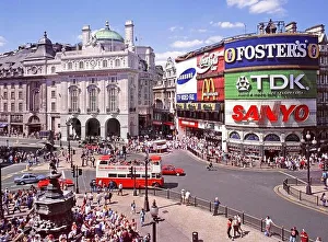 Iconic London West End 1995 tourism aerial archive image looking down on crowds of tourists around Eros statue