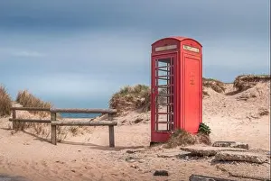 Phone Prints: The iconic and weathered red telephone box on Shell Bay beach