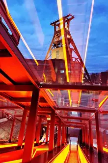 North Rhine Westphalia Prints: Illuminated gangway with the headframe of Zollverein Coal Mine Industrial Complex Shaft XII