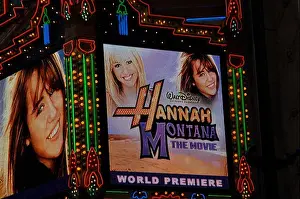 2009 Prints: The illuminated marquee of the El Capitan Theatre displays the title Hannah Montana
