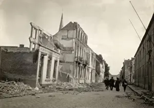 Historical Site Prints: The image from 1914 shows the burned-out Gasthuis in Dendermonde