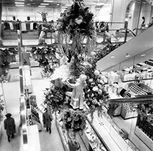 Floor Prints: This image from 1965 shows the main floor elevator of Hess Brothers Department Store in Allentown