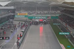 Teams Prints: This image captures a moment from the 2012 Malaysian Grand Prix